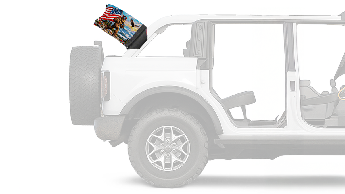 Bigfoot Patriot Forever Wave flag mounted on a Ford Bronco roll bar
