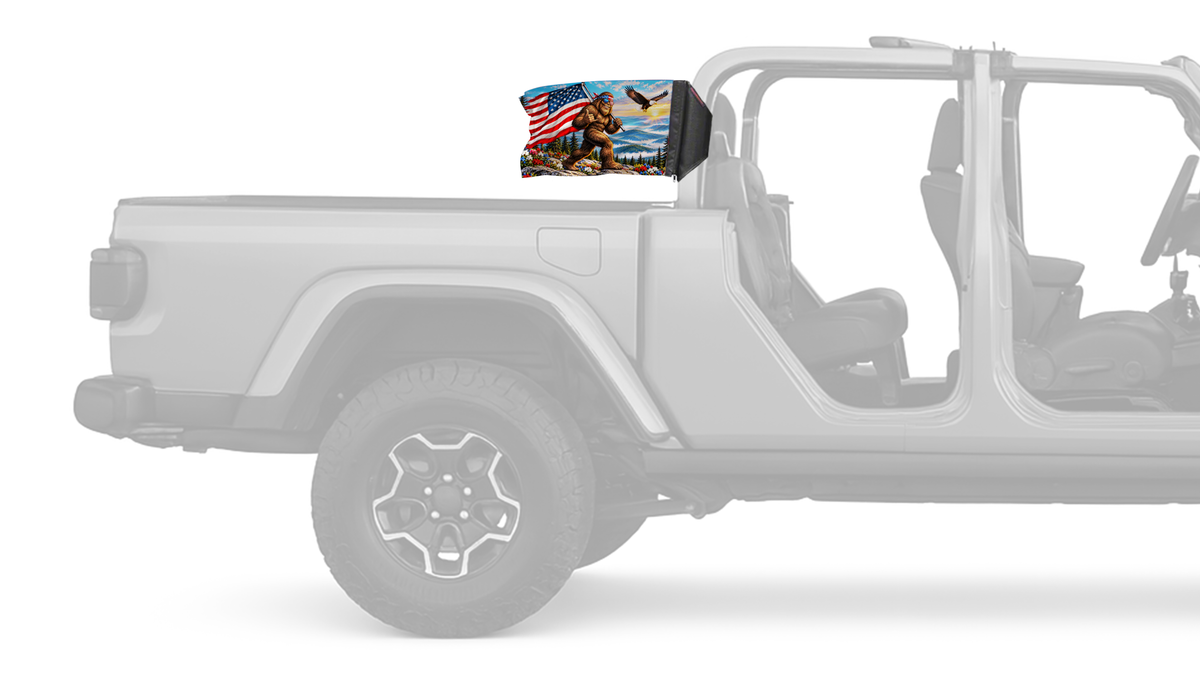 Bigfoot Patriot Forever Wave flag mounted on a Jeep Gladiator roll bar sleeve