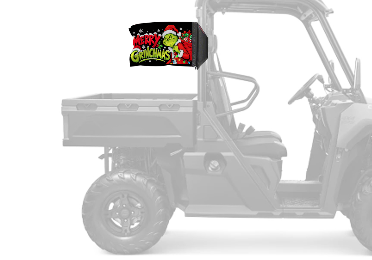 Merry Grinchmas Forever Wave flag mounted on a UTV