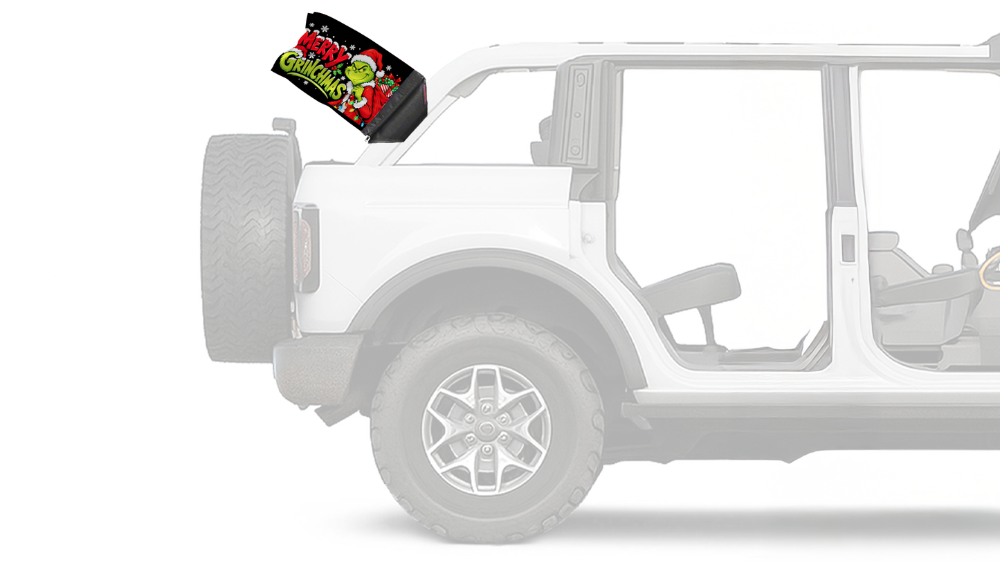 Merry Grinchmas Forever Wave flag mounted on a Ford Bronco roll bar
